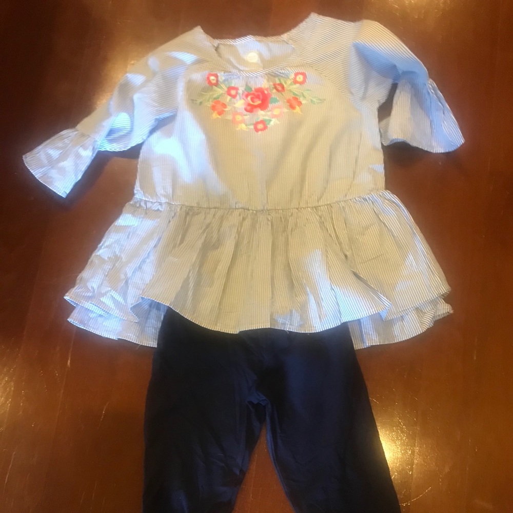 Two girls shirts with pants